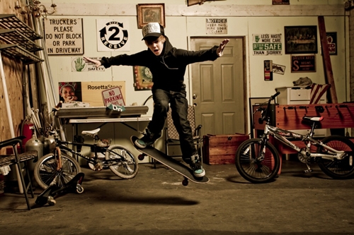 Justin Bieber showing off a skateboarding trick